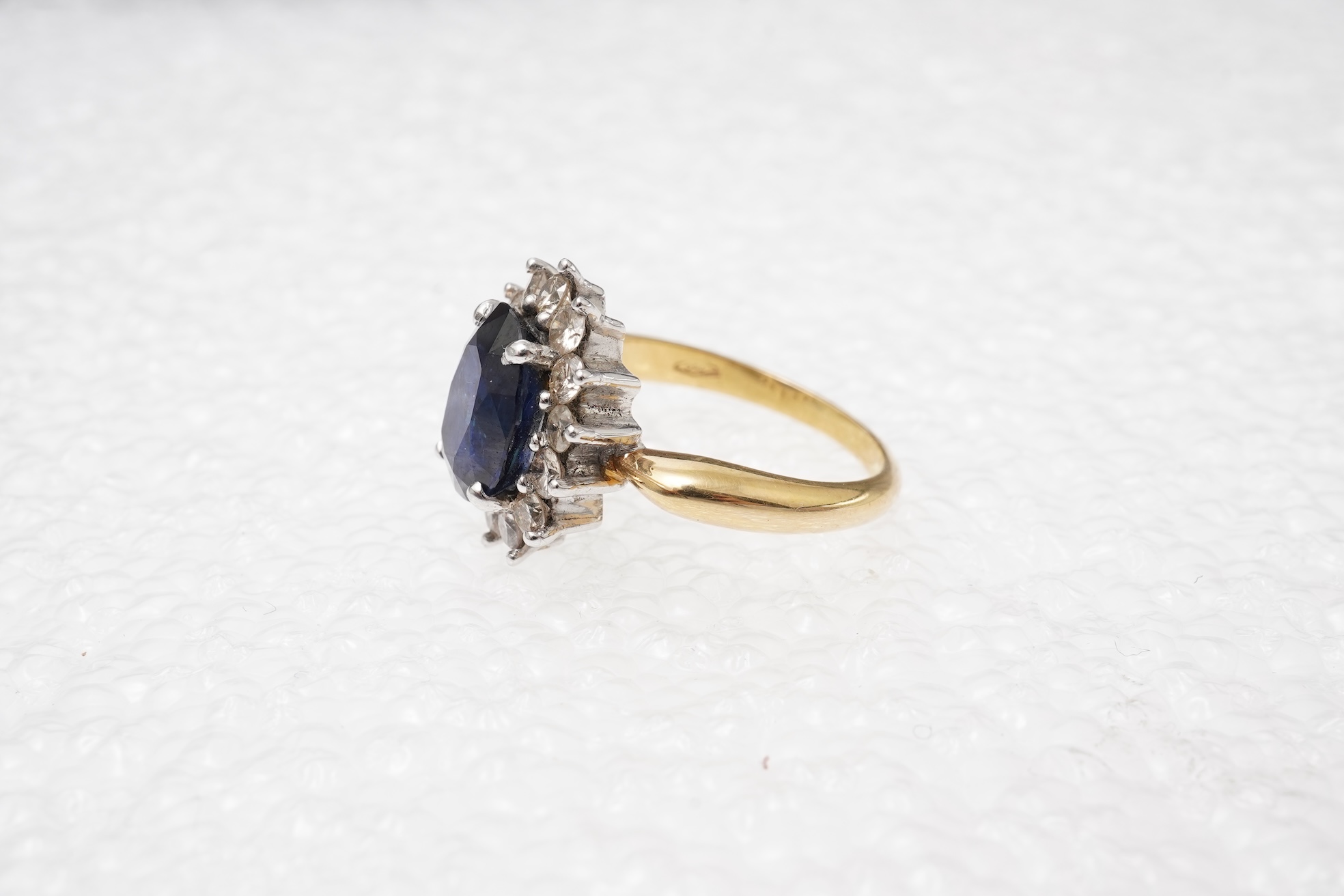 A sapphire and diamond cluster ring